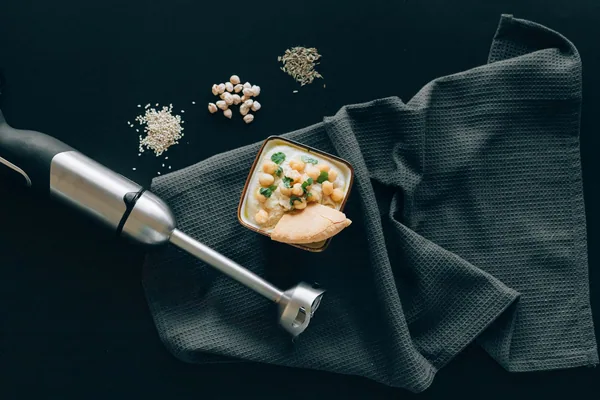 Crema de verduras con toppings
